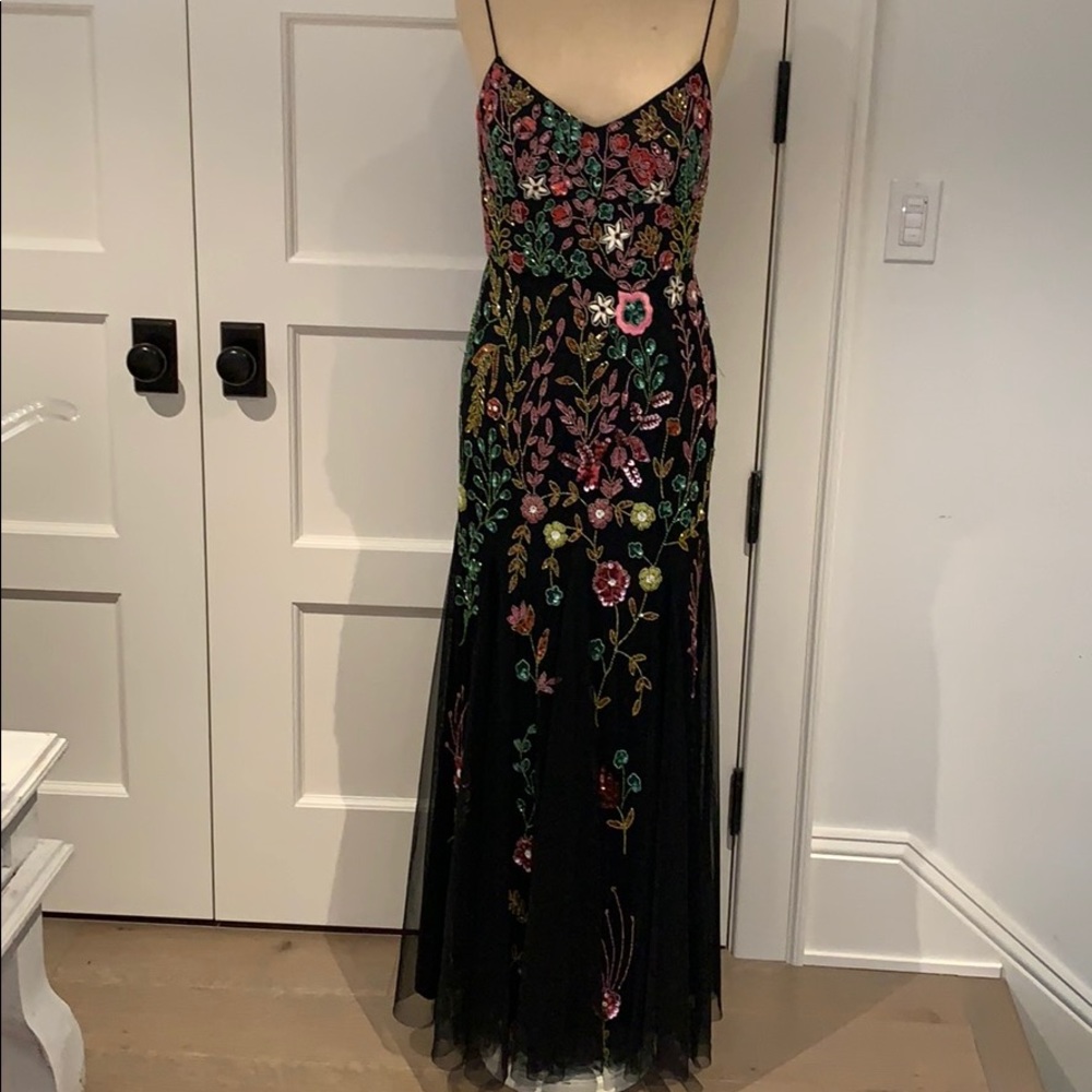 Adrianna papal gown